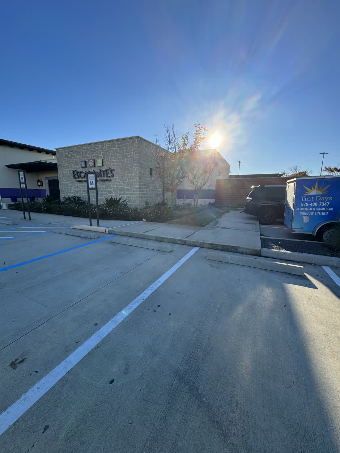 A commercial building in hard afternoon sun