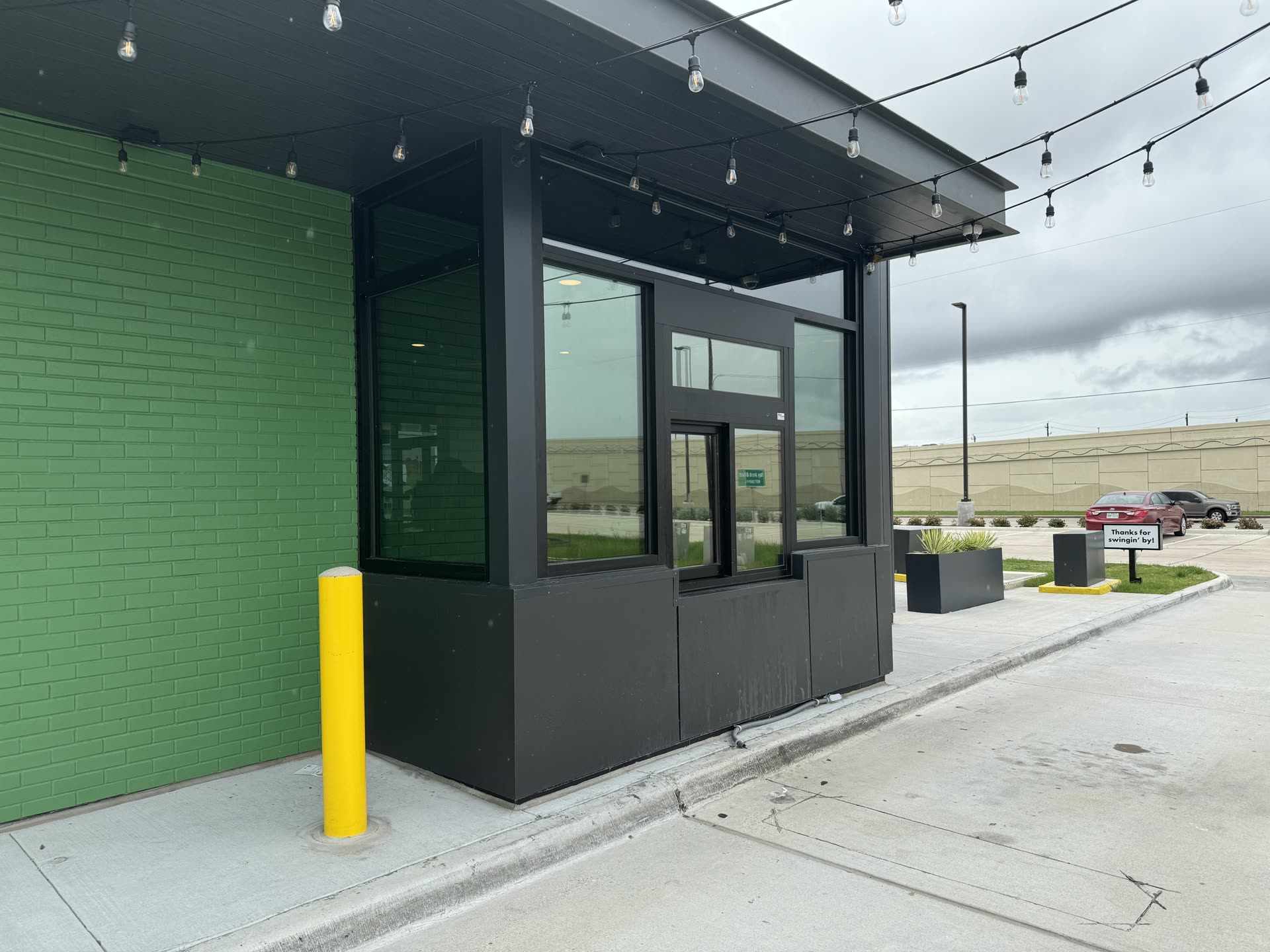 A drive-thru window in Webster with tinted glass